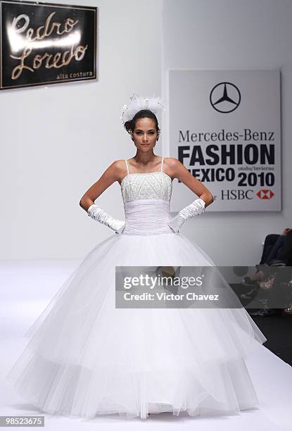 Model walks the runway wearing Pedro Loredo during Mercedes-Benz Fashion Mexico Autumn Winter 2010 at Campo Marte on April 16, 2010 in Mexico City,...