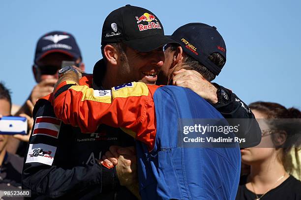 Matt Hall of Australia celebrates his 2nd, Hannes Arch of Austria his 1st place after the Red Bull Air Race Day on April 18, 2010 in Perth, Australia.