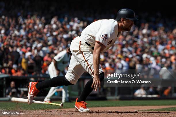 Hunter Pence of the San Francisco Giants hits a two run walk off double against the San Diego Padres during the eleventh inning at AT&T Park on June...