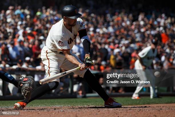 Hunter Pence of the San Francisco Giants hits a two run walk off double against the San Diego Padres during the eleventh inning at AT&T Park on June...