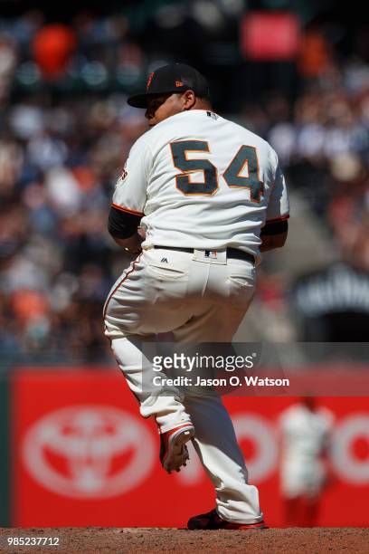 Reyes Moronta of the San Francisco Giants pitches against the San Diego Padres during the eleventh inning at AT&T Park on June 24, 2018 in San...