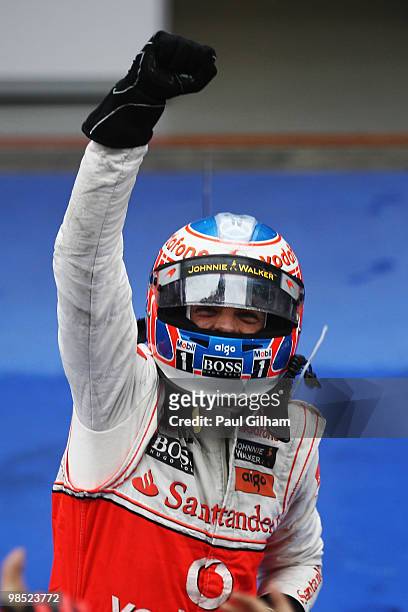 Jenson Button of Great Britain and McLaren Mercedes celebrates in parc ferme after winning the Chinese Formula One Grand Prix at the Shanghai...