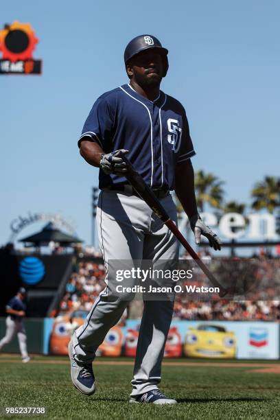 Jose Pirela of the San Diego Padres returns to the dugout after striking out against the San Francisco Giants during the tenth inning at AT&T Park on...