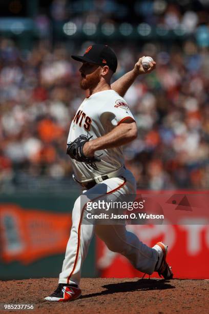 Sam Dyson of the San Francisco Giants pitches against the San Diego Padres during the tenth inning at AT&T Park on June 24, 2018 in San Francisco,...