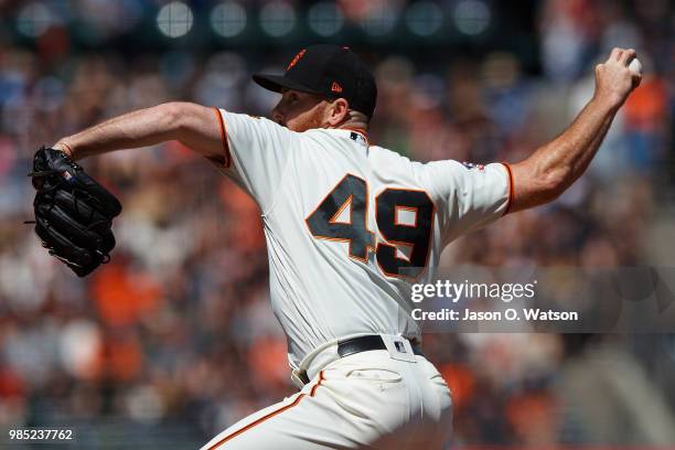 Sam Dyson of the San Francisco Giants pitches against the San Diego Padres during the tenth inning at AT&T Park on June 24, 2018 in San Francisco,...