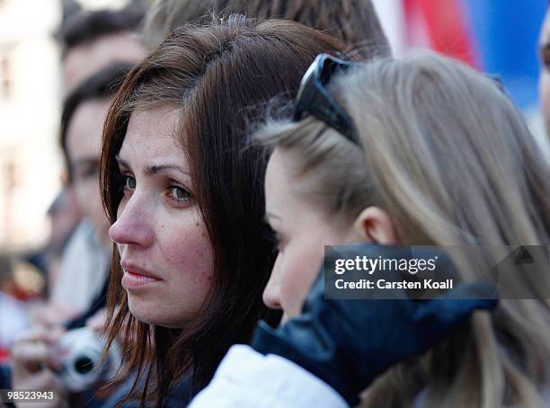 Woman is crying as the coffins of late Polish President Lech Kazcynski and his wife Maria arrive at the St Mary's Basilica on April 18, 2010 in...