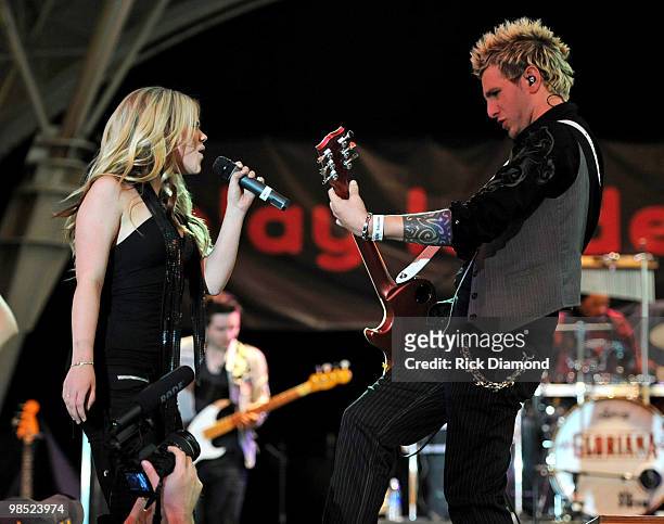 Musicians Cheyenne Kimball and Mike Gossin of the band Gloriana perform onstage at the 45th Annual Academy of Country Music Awards concerts at the...