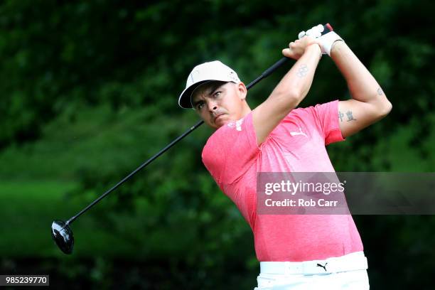 Rickie Fowler tees off on the seventh hole during the Pro-Am prior to the Quicken Loans National at TPC Potomac on June 27, 2018 in Potomac, Maryland.