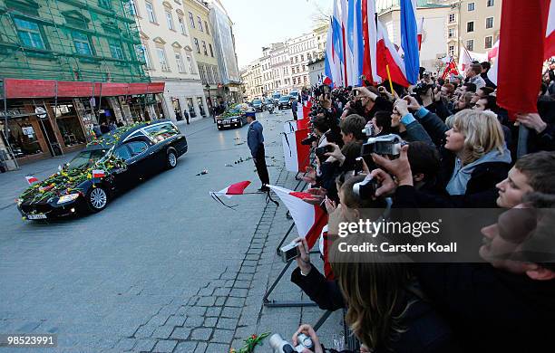 The coffins of late Polish President Lech Kazcynski and his wife Maria arrive at the St Mary's Basilica on April 18, 2010 in Krakow, Poland. The...