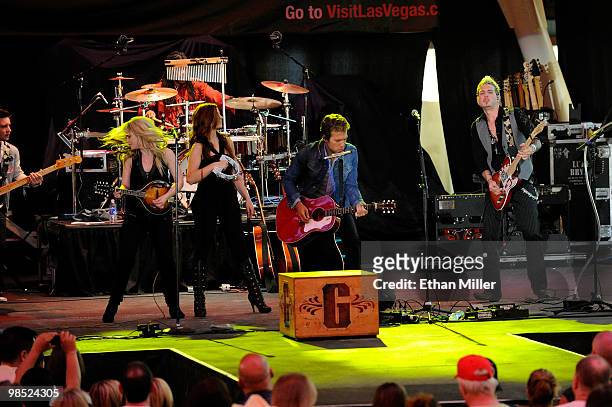 Musicians Cheyenne Kimball, Rachel Reinert, Tom Gossin and Mike Gossin of the band Gloriana perform onstage at the 45th Annual Academy of Country...