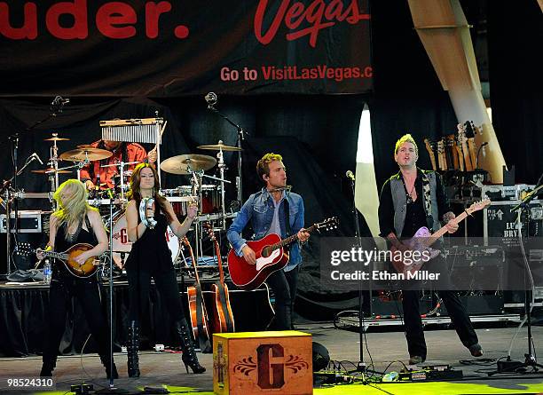 Musicians Cheyenne Kimball, Rachel Reinert, Tom Gossin and Mike Gossin of the band Gloriana perform onstage at the 45th Annual Academy of Country...