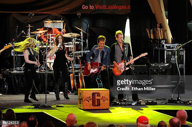 Musicians Cheyenne Kimball, Rachel Reinert, Tom Gossin and Mike Gossin of the band Gloriana perform onstage at the 45th Annual Academy of Country...