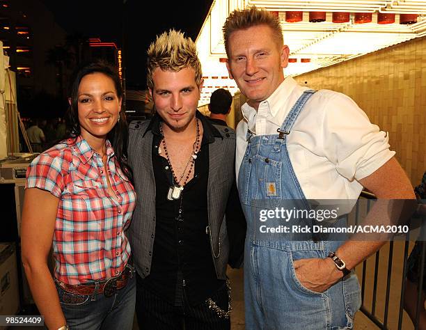 Musicians Joey Martin and Rory Feek of Joey + Rory with musician Mike Gossin of the band Gloriana at the 45th Annual Academy of Country Music Awards...