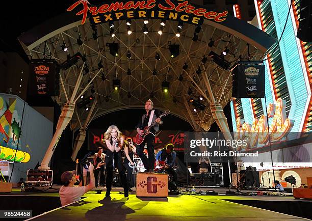 Musicians Cheyenne Kimball, Mike Gossin and Tom Gossin of the band Gloriana perform onstage at the 45th Annual Academy of Country Music Awards...