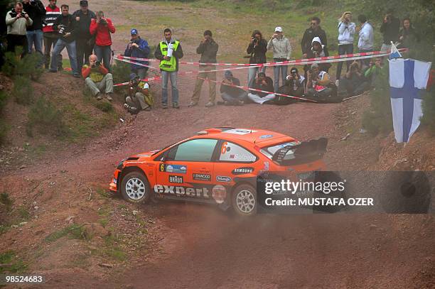 Norway Henning Solberg of co-driver Ilka Minor of Austria compete in their Stobart Ford Focus on the 3rd day of the WRC Rally of Turkey on April 18...