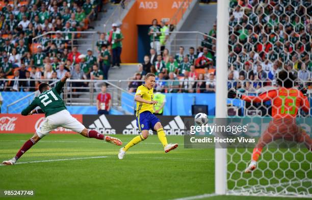 Ludwig Augustinsson of Sweden scores his team's first goal during the 2018 FIFA World Cup Russia group F match between Mexico and Sweden at...