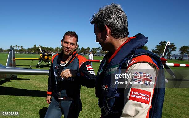 Paul Bonhomme of Great Britain celebrates his 3rd and Hannes Arch of Austria his 1st place after the Red Bull Air Race Day on April 18, 2010 in...