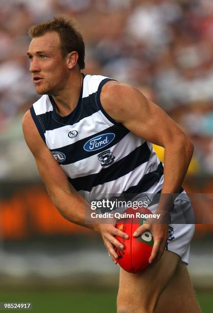 Darren Milburn of the Cats kicks during the round four AFL match between the Geelong Cats and the Port Adelaide Power at Skilled Stadium on April 18,...