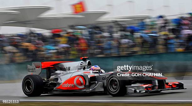 McLaren-Mercedes driver Jenson Button of Britain drives his car to victory in Formua One's Chinese Grand Prix in Shanghai on April 18, 2010. Button...