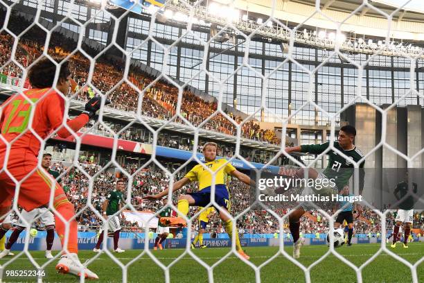 Edson Alvarez of Mexico scores an own goal to put Sweden 3-0 during the 2018 FIFA World Cup Russia group F match between Mexico and Sweden at...