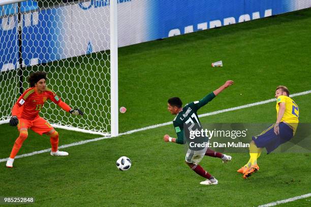 Edson Alvarez of Mexico scores an own goal to put Sweden 3-0 during the 2018 FIFA World Cup Russia group F match between Mexico and Sweden at...