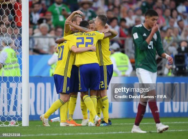 Emil Forsberg, Ola Toivonen, Isaac Kiese Thelin ans Emil Forsberg of Sweden celebrate their team's third goal, an own goal scored by Edson Alvarez of...