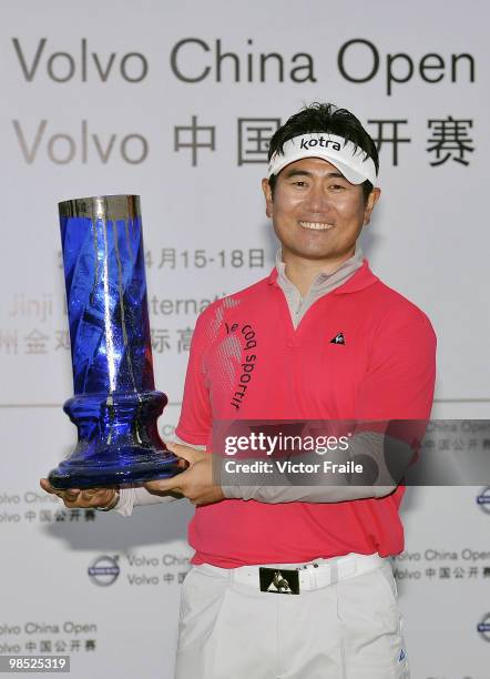 Yang of Korea poses with the trophy after winning the Volvo China Open on April 18, 2010 in Suzhou, China.