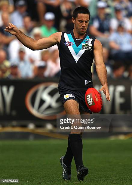 Troy Chaplin of the Power kicks during the round four AFL match between the Geelong Cats and the Port Adelaide Power at Skilled Stadium on April 18,...