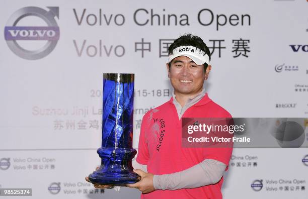 Yang of Korea poses with the trophy after winning the Volvo China Open on April 18, 2010 in Suzhou, China.