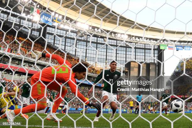 Edson Alvarez of Mexico scores an own goal to put Sweden 3-0 during the 2018 FIFA World Cup Russia group F match between Mexico and Sweden at...