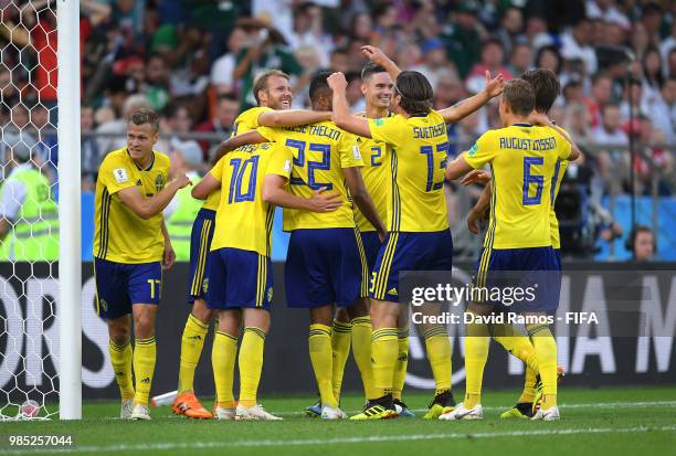 Players of Sweden celebrate their team's third goal, an own goal scored by Edson Alvarez of Mexico, during the 2018 FIFA World Cup Russia group F...