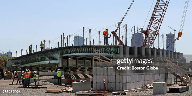 Bridge beams and construction materials are staged and assembled for the Commonwealth Avenue Bridge Project at the Beacon Park Yard in the Allston...