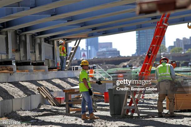 Bridge beams and construction materials are staged and assembled for the Commonwealth Avenue Bridge Project at the Beacon Park Yard in the Allston...
