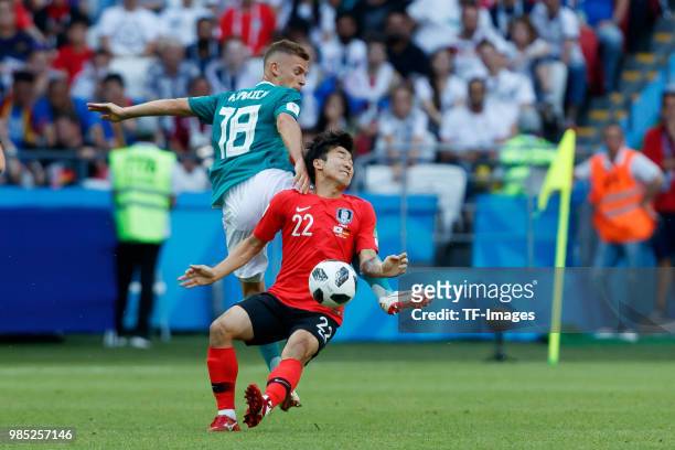 Joshua Kimmich of Germany and Yo-han Ko of Korea Republic battle for the ball during the 2018 FIFA World Cup Russia group F match between Korea...