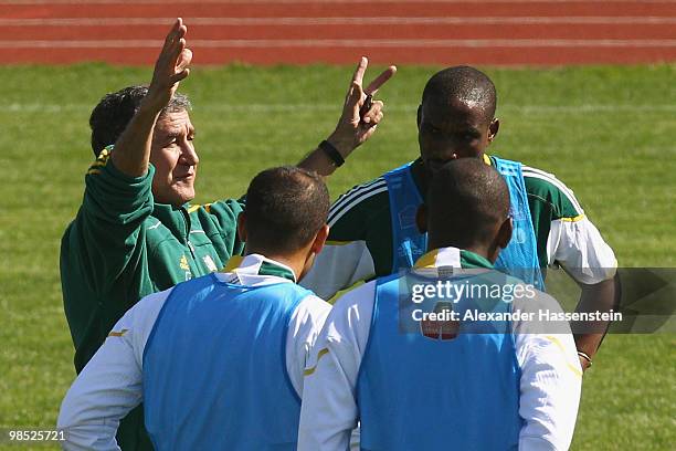 Carlos Alberto Gomes Parreira, head coach of South African national football team gives instructions to his players during a training session of the...