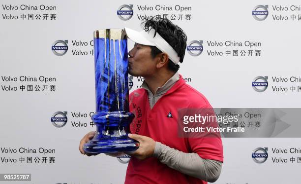 Yang of Korea poses with the trophy after winning the Volvo China Open on April 18, 2010 in Suzhou, China.