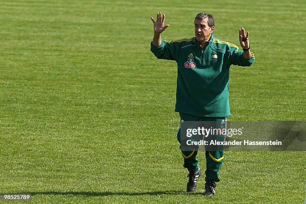 Carlos Alberto Gomes Parreira, head coach of South African national football team gives instructions to his players during a training session of the...