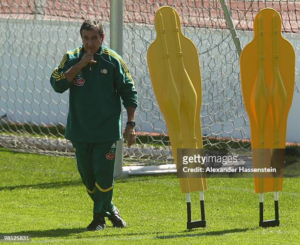Carlos Alberto Gomes Parreira, head coach of South African national football team gives instructions to his players during a training session of the...
