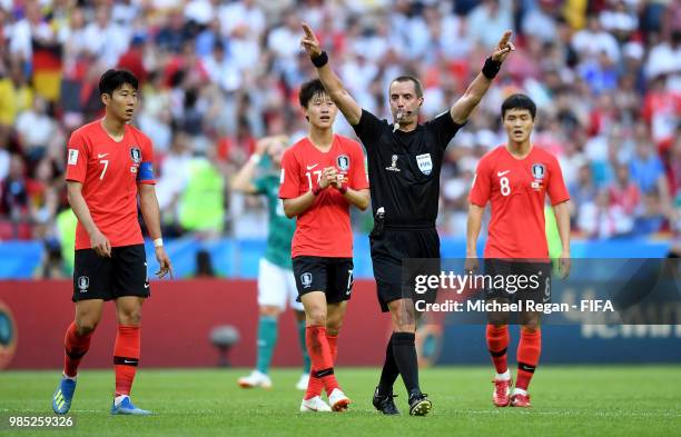 Referee Mark Geiger announces hes going to VAR during the 2018 FIFA World Cup Russia group F match between Korea Republic and Germany at Kazan Arena...