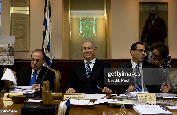 Israeli Deputy Prime Minister Silvan Shalom, Israeli Prime Minister Benjamin Netanyahu and Cabinet Secretary Zvi Hauzer attend the weekly cabinet...