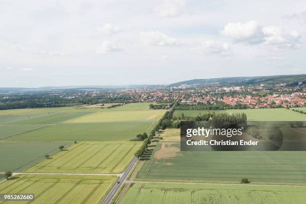 drone flight over the fields in lower saxony, göttingen in germany - göttingen stock-fotos und bilder