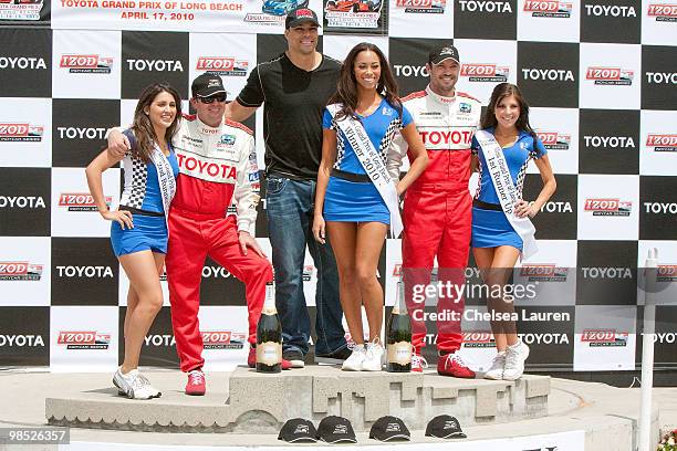 Professional racecar driver Jimmy Vasser , NFL player Tony Gonzalez of the Atlanta Falcons and actor Brian Austin Green pose with Toyota executives...