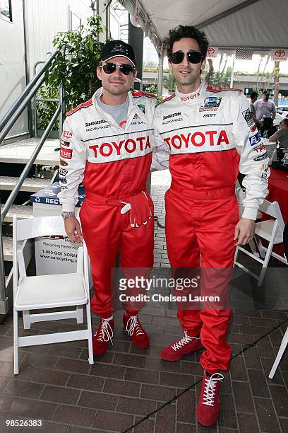 Actors Christian Slater and Adrien Brody attend the Toyota Grand Prix Pro / Celebrity Race Day on April 17, 2010 in Long Beach, California.