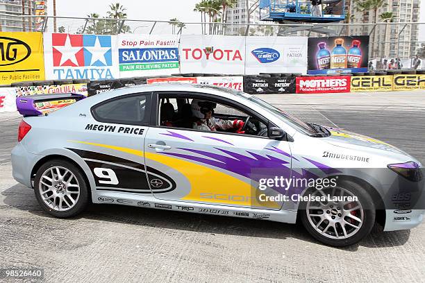 Actress Megyn Price races at the Toyota Grand Prix Pro / Celebrity Race Day on April 17, 2010 in Long Beach, California.