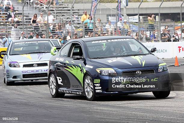 Actor Brian Austin Green and actor / comedian Adam Carolla race at the Toyota Grand Prix Pro / Celebrity Race Day on April 17, 2010 in Long Beach,...
