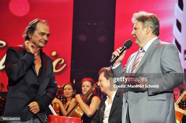 Christian Kolonovits and Michael Ludwig pose on stage during the 'Best of Austria meets Classic' Concert at Wiener Stadthalle on June 21, 2018 in...