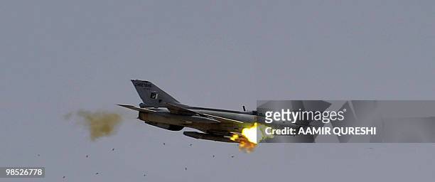 Pakistani aircraft fires at a target as it takes part in a military exercise in Bahawalpur on April 18, 2010. The "Azm-e-Nau-3" military exercise,...