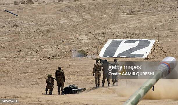 Pakistani soldiers fire a rocket to hit a target as they take part in a military exercise in Bahawalpur on April 18, 2010. The "Azm-e-Nau-3" military...