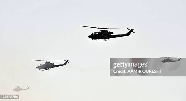 Pakistani AH-1 Cobra attack helicopters take part in a military exercise in Bahawalpur on April 18, 2010. The "Azm-e-Nau-3" military exercise, which...