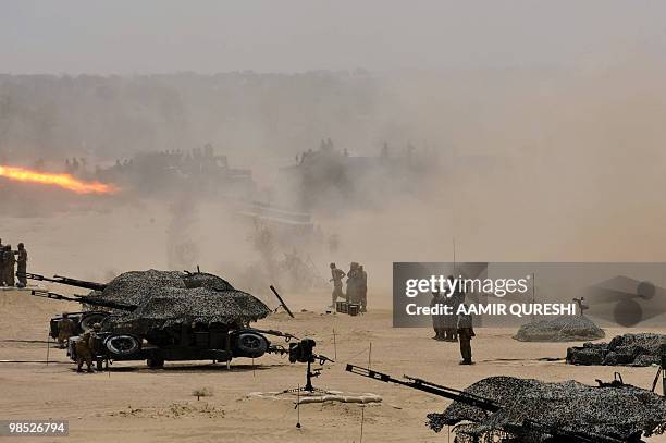 Pakistan soldiers use weaponry to hit their targets as they take part in a military exercise in Bahawalpur on April 18, 2010. The "Azm-e-Nau-3"...